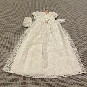 Brand new 2 piece Pippa and Julie christening gown with bonnet. 0-3 month size.